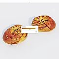 Two Golden Brown Swirled Bread Loaves With Almond Slices On White Background