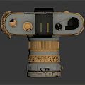 Vintage Digital Camera With Gold And Silver Decorative Design Details
