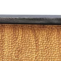 Elegant Reception Desk With Dark Wooden Frame And Golden Textured Marble Countertop Top