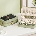 Elegant Light Green Jewelry Box With Rings Earrings And Organized Compartments
