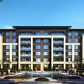 Modern Mid Rise Residential Building Exterior With Balconies Greenery And Fountains