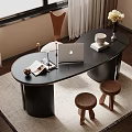 Modern Black Oval Desk With MacBook Coffee Cup Notebook Vase On Carpet And Wooden Stools