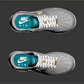 Gray Sports Shoes With Gold Side Accents White Laces And Teal Soles