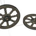 Two Vintage Wooden Wheels With Carved Spokes And Aged Natural Texture