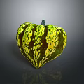 Vibrant Heart Shaped Pumpkin with Green Yellow Spotted Pattern as Decorative Plant