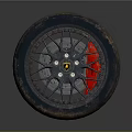 Car Wheel With All Terrain Tread Pattern And Black Alloy Rim Red Accents
