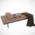 Modern Brown Sofa Bench with Zebra Print Pillow and Brown Blanket on Black Legs
