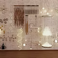 Various Designed Chandeliers Including Geometric Spiral Spherical Metal Hanging On Textured Wall With Wooden Floor