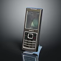 Classic Nokia Mobile Phone Featuring Display Screen And Keypad On Stand 3d model