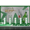 Heineken Beer Promotional Display With Green Background And Bottle Setup
