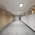Modern Minimalist Public Toilet Wash Area With Large Backlit Mirror Marble Countertop And Wooden Cabinets