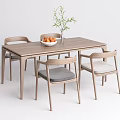 Minimalist Wooden Dining Table Set With Four Chairs Fruit Bowl And Green Plant