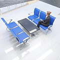Blue Public Chairs In Modern Lobby Area With Woman Sitting And Coffee Table