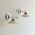 Modern Wall Mounted Lamps With Colorful Disc Accents And Cream Shades