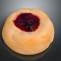 Delicious Round Bun With Sweet Berry Jam Filling And Golden Crust