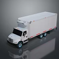 White Box Truck With Long Cargo Container And Blue Wheels On Dark Surface