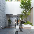 Modern Garden Landscape Design With White Steps Red Leaf Tree Trimmed Shrubs And Stone Wall