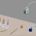 Desk Setup Featuring Desk Lamp Pen Holders Pencils Cone And Blue Sphere