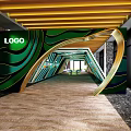 Modern Entrance Hall Interior With Green Wave Wall Yellow Wooden Ceiling Brown Carpet And Logo
