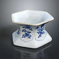 Blue And White Hexagonal Ceramic Vessel With Floral Patterns And Traditional Design