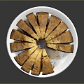 Golden Sliced Round Cake Served On White Plate With Dark Background