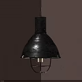 Black Bell Shaped Pendant Light With Metal Cage Illuminated On Gray Wall