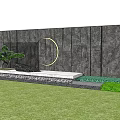 Outdoor Feature Wall With Marble Texture And Green Base Trim On Paved Ground