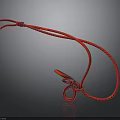 Red Rope With Intricate Knots And Loop Structure On Dark Background
