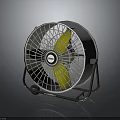 Electric Fan With Yellow Blades And Metal Mesh Cover On Base Stand