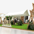 20th Anniversary Celebration Event With Tented Setup Wooden Decorations And Green Plants