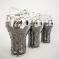 Refreshing Chilled Coca Cola Bottles With Ice Cubes And Water Droplets