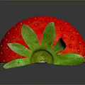 Fresh cut strawberry with red flesh and green leaves on dark reflective surface