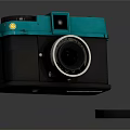 Vintage Digital Camera With Turquoise Top And Black Body Featuring Classic Lens And Cap