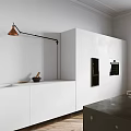 Modern Kitchen Interior With Black Marble Island White Cabinets Brass Pendant Lights And Wooden Flooring