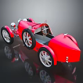Red Vintage Open Top Race Car With Large Wheels And Metallic Accents