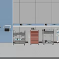 Medical Equipment in Hospital Room With Colorful Medical Carts and Wall Panels