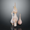 Three Unique Shaped Decorative Ceramic Furniture Pieces With Natural Tones And Textured Surface