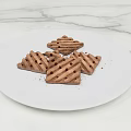 Delicious Chocolate Cookies on White Plate with Striped Pattern Dusted over Marble Countertop