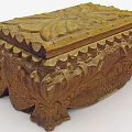 Vintage Carved Wooden Box With Intricate Floral Patterns And Decorative Base