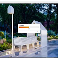 White Landscape Bench With Roofed Structure In Garden With Green Plants And Trees