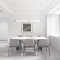 Modern Restaurant Interior With White Dining Table Gray Chairs Black Framed Painting And Pendant Lights