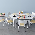 Round Table And White Chair Set With Yellow Seats Building Blocks In Kids Play Area