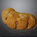 Freshly Baked Golden Curved Bread With Sesame Seeds And Shiny Crust