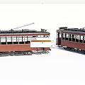 Vintage Trams Side By Side With Red Carriages Windows And Roof Pantographs