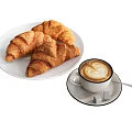 Freshly Baked Croissants with Latte Foam Art on White Plate with Sugar Cubes and Spoon