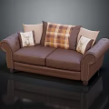 Classic Brown Leather Two Seater Sofa With Plaid And Beige Patterned Cushions And Curved Arms
