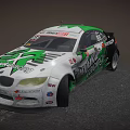 White And Green BMW Race Car With Sponsor Logos On Track