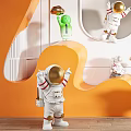 Vibrant Astronaut Sculptures With Gold Accents In Orange And White Background And Wavy Display Platforms