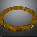 Golden Circular Decorative Furniture Element With Twisted Design And Red Accents