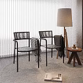 Accent Chairs With Black Frames Gray Cushions And Blankets In Modern Interior With Floor Lamp